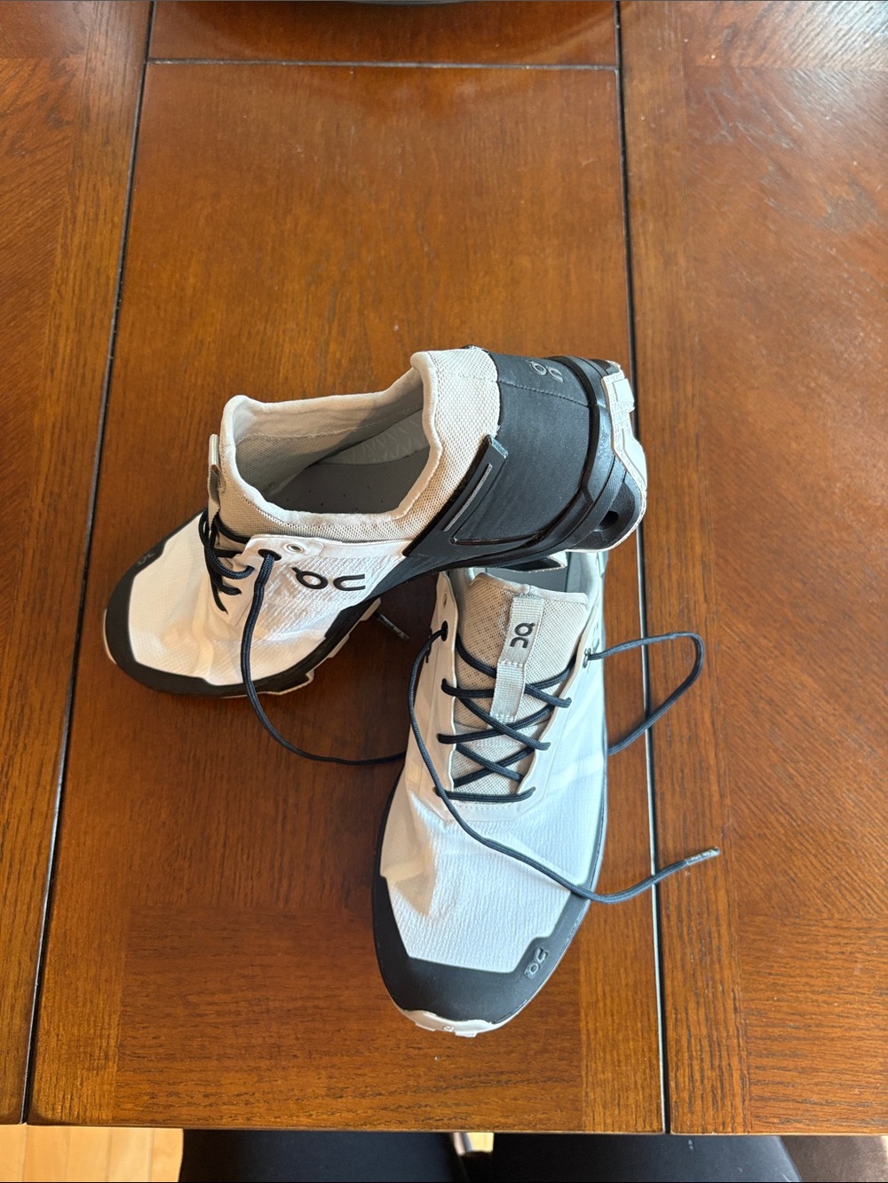 On Running Women’s White and Black Athletic Running Shoes
